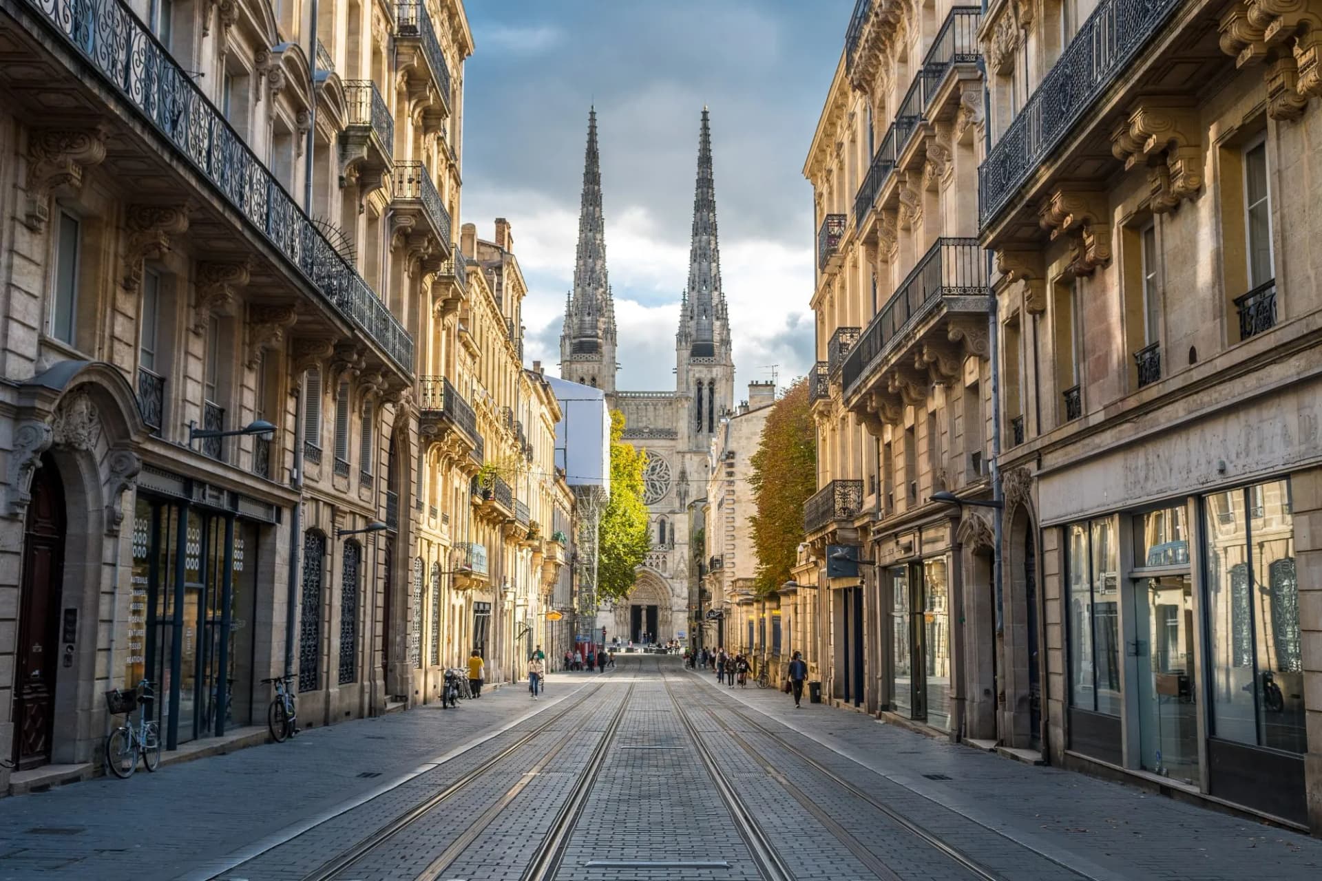Tram tracks down street toward Saint-André Cathedral in Bordeaux, France