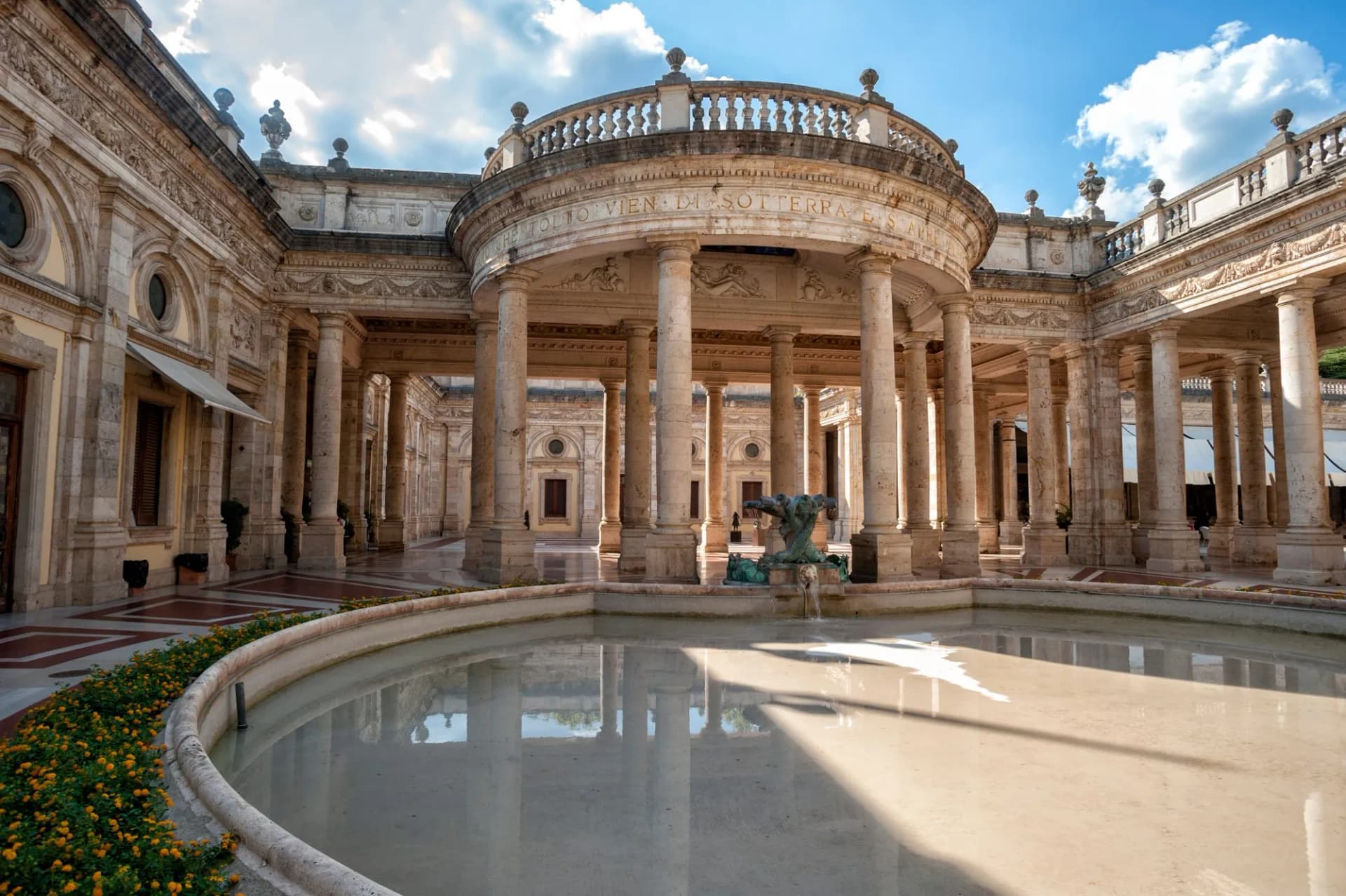 Historic Baths of Tettuccio colonnade courtyard with fountain pool in Montecatini Terme, Tuscany.